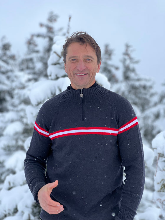 Graham  Bell wears Snow Finel Ski Jumper in the snow