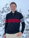 Graham Bell wears Snow Finel Black stripy jumper in the snow