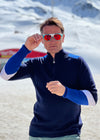 Graham Bell wears Snow finel navy ski jumper in the snow