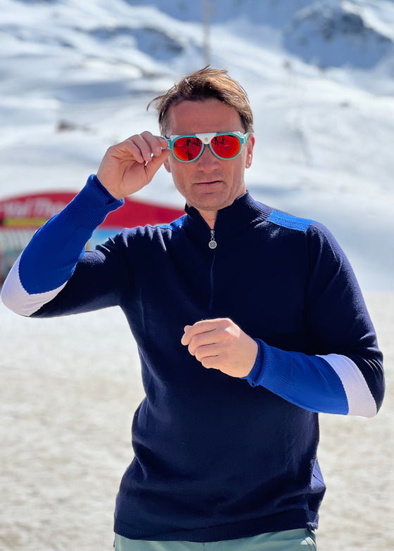 Graham Bell wears Snow finel navy ski jumper in the snow